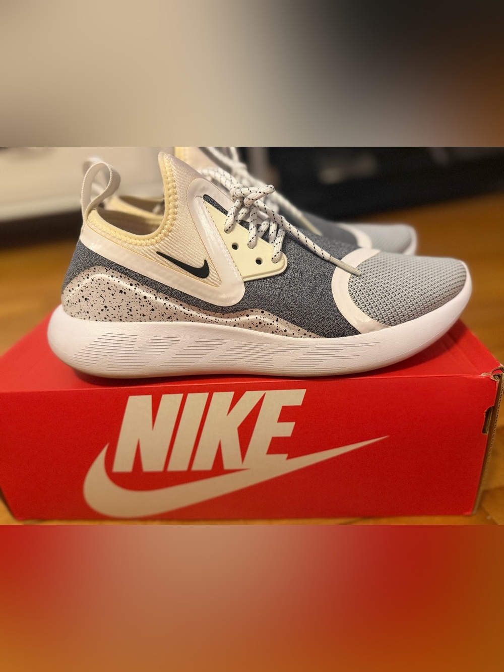 Nike Womens Gray and Cream Lunarcharge Essential sneaker